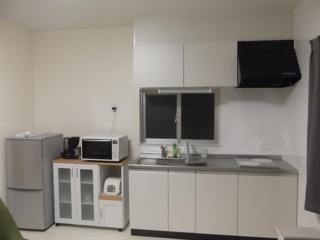 Rainbow Terrace Ginowan Apartment Exterior foto